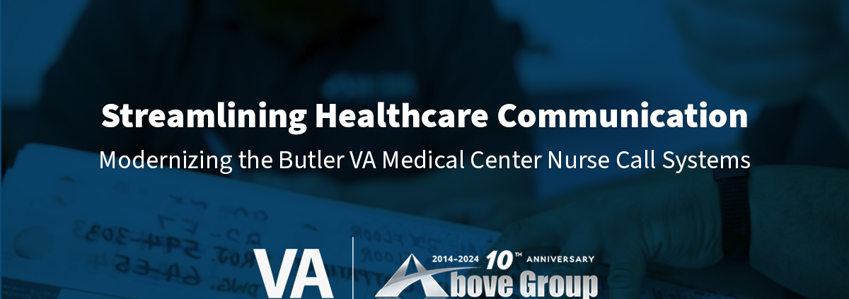 Two engineers reviewing engineering drawings with a blue overlay featuring the blog title "Streamlining Healthcare Communications" with the Department of Veterans Affairs and Above Group, Inc. logos.